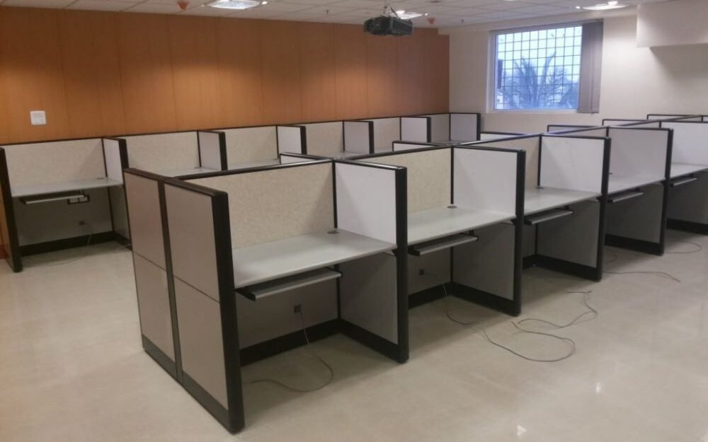 western interio,executive table,office sofa,storage solution,workstation,conference table,computer table,office desk,revolving chair,reception table,office furniture,customised furniture,modular furniture,modular office furniture,reception desk
